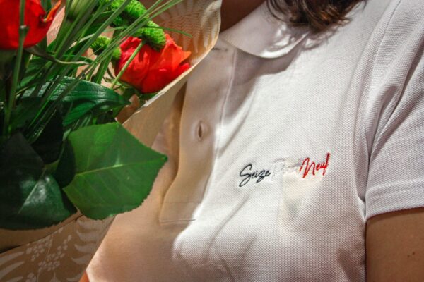 Polo blanc avec fleur 16.9